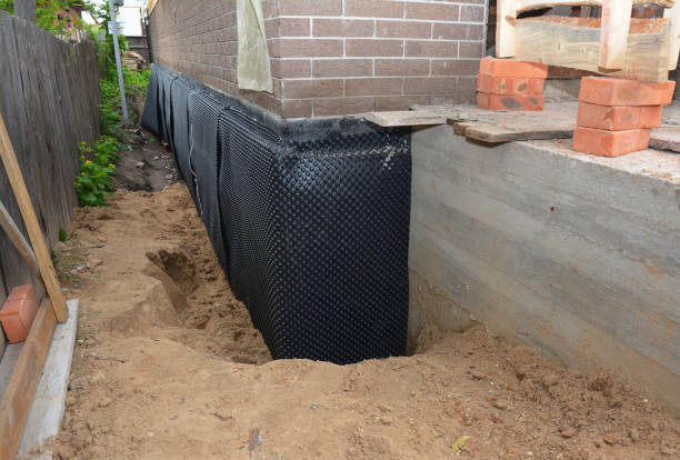 Happy homeowners after waterproofing job in Margaret